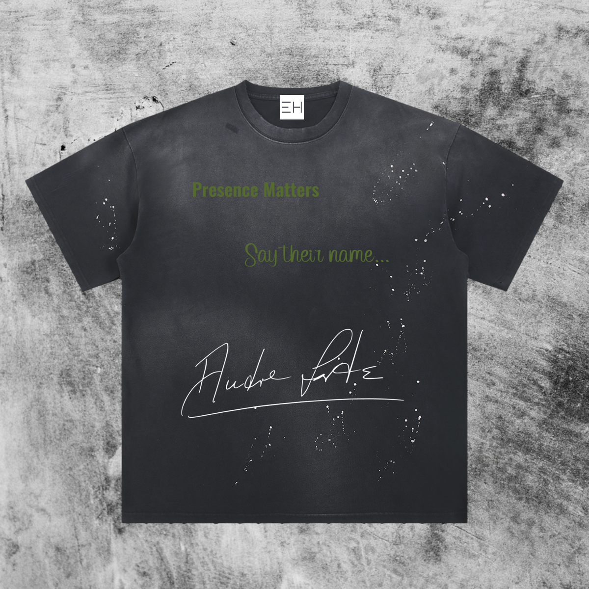 Eleve Homme vintage-washed gray cotton oversized tee featuring Audre Lorde signature and Presence Matters text