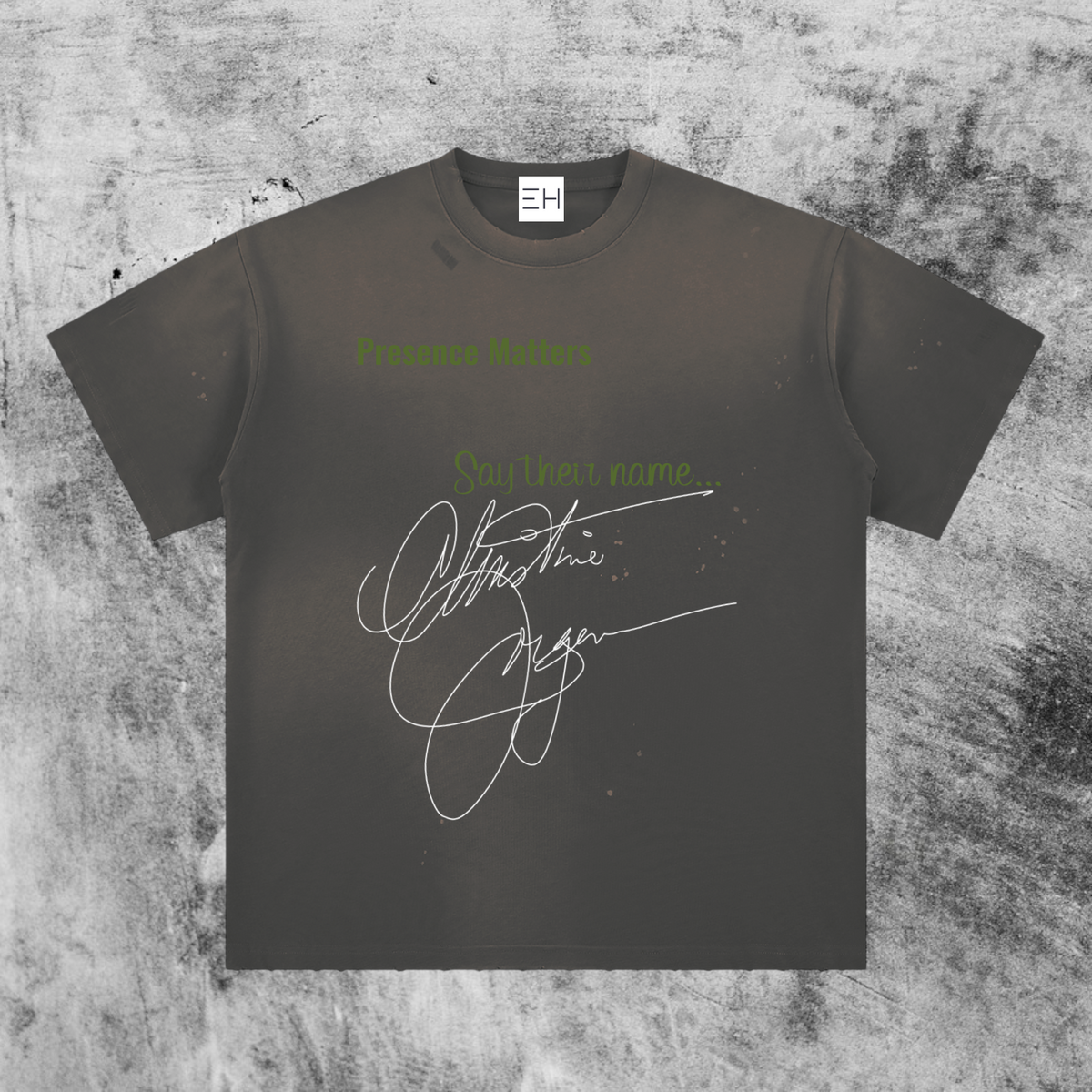 Eleve Homme vintage-washed gray oversized cotton t-shirt with green text and a white signature graphic